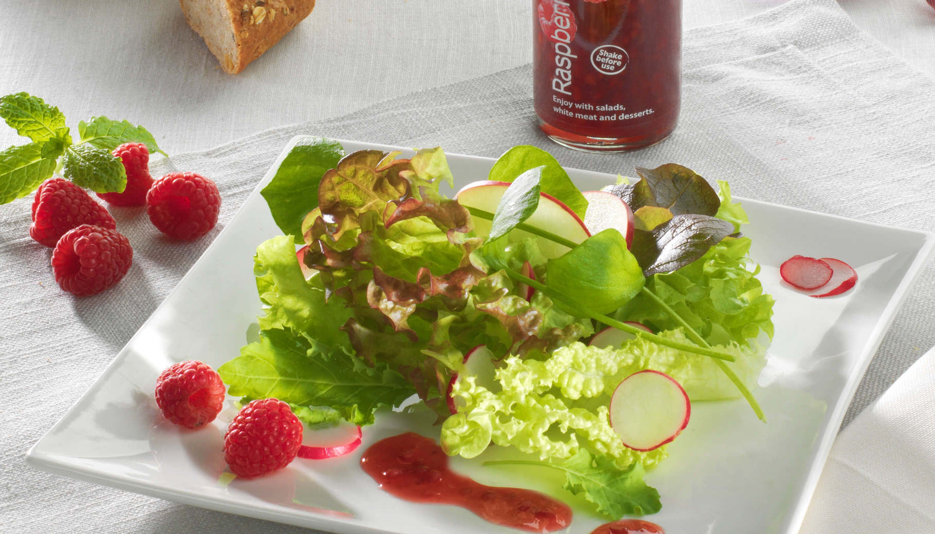 Salade fraîche et son dressing à la framboise